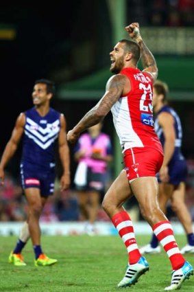 All class: Sydney's Lance Franklin celebrates one of his four goals against Fremantle.