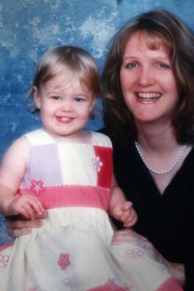 Murdered woman Sally Brooks with one of her three children.