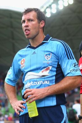Lucas Neill looks dejected after Sydney FC lost to Melbourne Heart.
