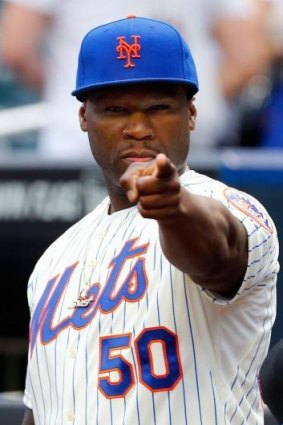 Bad pitch: Rap artist 50 Cent looks on before throwing the ceremonial first pitch of a game between the New York Mets and the Pittsburgh Pirates.