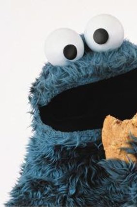 Cookie Monster shows that learning can be fun in <em>Sesame Street</em>.