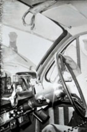 Andy Tsionis in his cab in the 1960s.