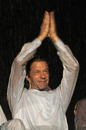 Freedom: Imran Khan applauds supporters during an anti-government rally in Islamabad. 