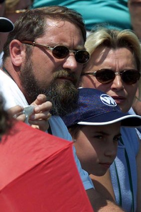 Jelena Dokic's father Damir, brother Savo and mother Liliana watch her at Wimbledon in 2001.
