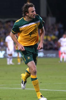 Man of the moment ... Josh Kennedy scores two of Australia's winning goals.