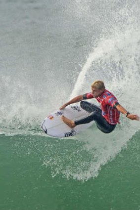 Easy: Mick Fanning cruises to a round-one win.