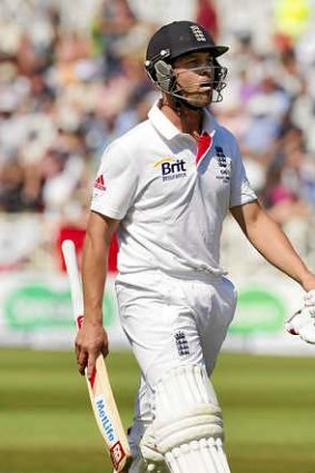 Not happy: Jonathan Trott walks from the pitch.