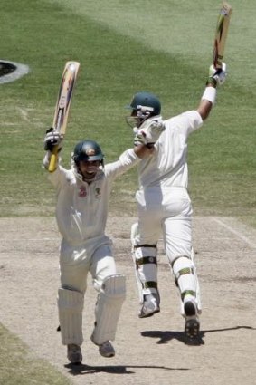 Justin Langer and Matthew Hayden celebrate after scoring the winning runs over England in the fifth and final Ashes cricket test in 2007.