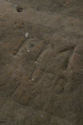 Made his mark: Frederick Meredith's initials and date on Garden Island.