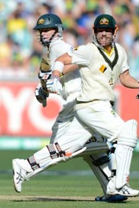 Chris Rogers and David Warner take one more run towards the victory target of 231 on Saturday.