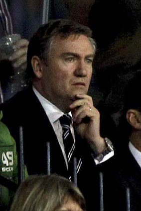 Magpies president Eddie McGuire feels the pinch as he watches his team in a close game.
