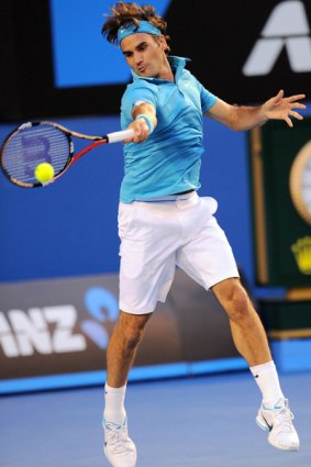 Masterclass ... Roger Federer crushes a forehand.