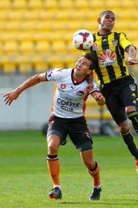 Kenny Cunningham  and Shane Stafanutto go head-to-head during the round one A-League match at Westpac Stadium in New Zealand.