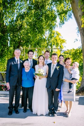 Roger (left) and Jill (holding child) Guard on their son 
Paul's wedding day. Amanda is on Paul's left, while David is at the rear next to Roger.