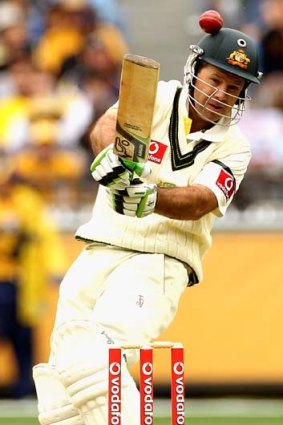 Wake-up call ... Ricky Ponting is struck on the helmet by youngster Umesh Yadav's delivery.