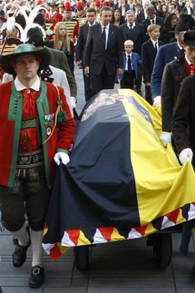 Otto Habsburg's sons follow the coffin.