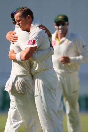 Lionheart: Peter Siddle celebrates a wicket.