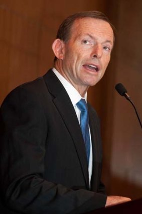 Attempting to ease internal divisions over foreign investment policy ... Opposition Leader Tony Abbott.