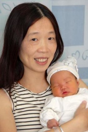 Australian citizen Charlotte Chou with her son Lincoln when he was born. 