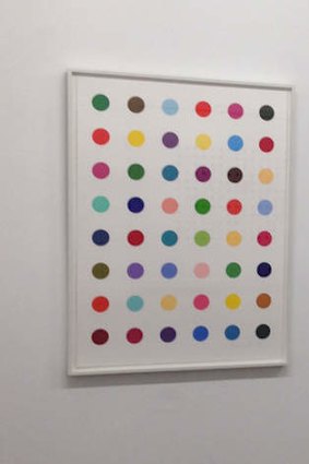 A print of Damien Hirst's 2008 'spot' artwork <i>Oleoylsarcosine</i>, which was stolen from a London art gallery.