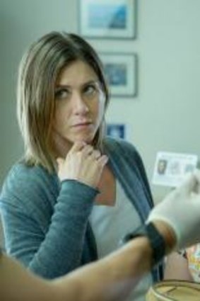 Jennifer Aniston (left) in the movie <i>Cake</i>. "There's something beautifully liberating about letting yourself be that exposed," she says.  