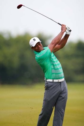 Tiger Woods during his match against Rory McIlroy in Haikou on Monday.