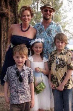 Mo, Evie and Otis Maslin (from left), victims of the MH17 crash. Their parents, Rin Norris and Anthony Maslin (at back), were not on board.