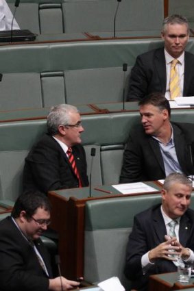 Independent MP Craig Thomson votes with the opposition during a division in Parliament.