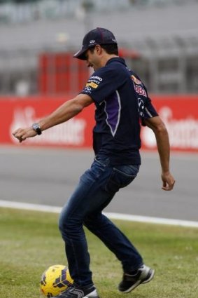 Daniel Ricciardo takes a penalty during a television broadcast at Silverstone.