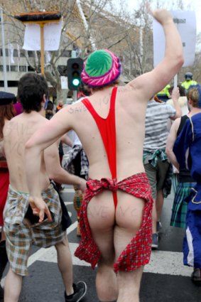 A student wears a mankini in the protest march.
