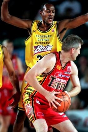 Leroy Loggins and Andrew Gaze face off in 1998.