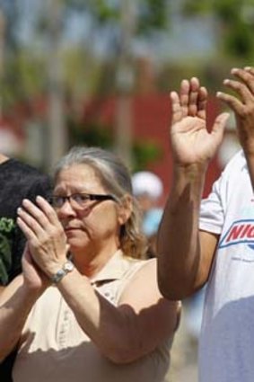 Unspeakable relief: The parents of kidnapping victim Gina DeJesus; Nancy DeJesus and Felix DeJesus (right)