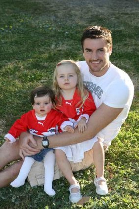 Darren Jolly with daughters Lily and Scarlett.