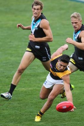 Balancing act: Robin Nahas leads Port Adelaide a merry dance at AAMI Stadium.