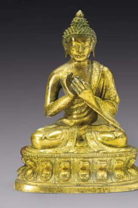 A gilt bronze figure of Buddha from the Qing dynasty, 18th century.