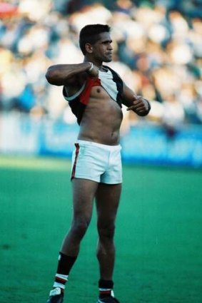 Moments before and after St Kilda footballer Nicky Winmar raises his jumper in response to racial taunts from Collingwood fans at Victoria Park in 1993.