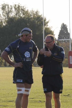 Jake White and Ben Mowen discuss tactics on Friday in Pretoria.