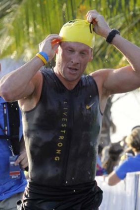 Lance Armstrong participates in the Ironman Panama 70.3 triathlon in Panama City in February last year.