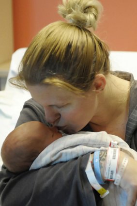 Tracy Hermanstorfer, whose heart stopped for four minutes during labour, and son Coltyn.