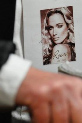 A family member holds a picture of Reeva Steenkamp in court.