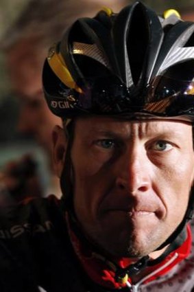In the shadows: Lance Armstrong.