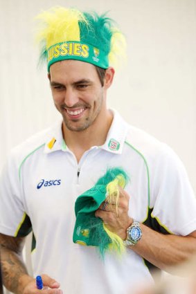 Mitchell Johnson signs autographs during a visit to Princess Margaret Hospital in Perth this week.