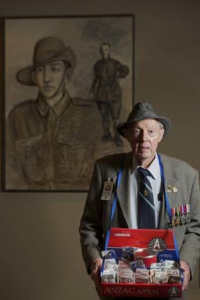 The right stuff: Graham Malloch uses his salesman skills to good effect when it comes to selling Anzac tokens.