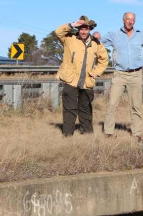 Author Bill Refshauge and Tim the Yowie Man on the new bridge which has replaced the old wooden bridge where Charlie McKeahnie fell