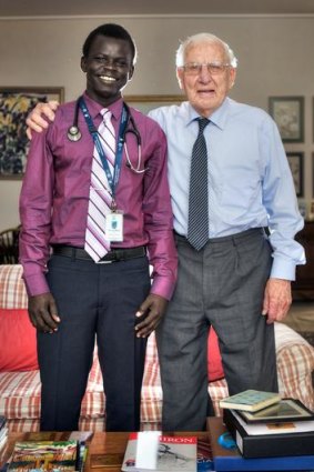 Soon-to-be graduate Garang Dut, 24, with Dr James Guest, 95.