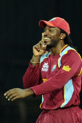 West Indies' Chris Gayle celebrates the wicket of Australia's Pat Cummings during the World T20 semi-final in Colombo.