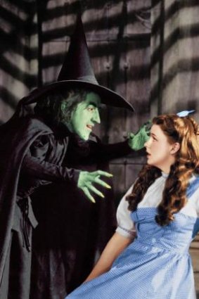 Judy Garland as Dorothy, with Margaret Hamilton as the Wicked Witch of the West.