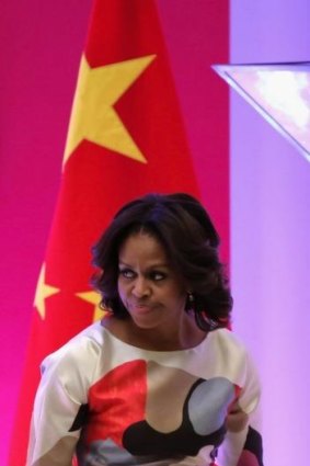 Pointed words: US First Lady Michelle Obama during her speech at Peking University's  Stanford Centre on Saturday.