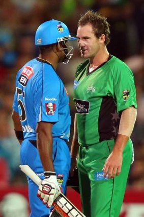 Words ... Kieron Pollard of the Strikers, left, in a confrontation with with John Hastings of the Stars.