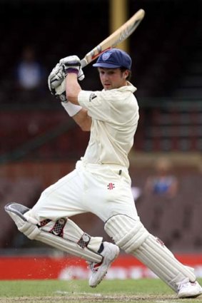 Cowan cuts a ball to the boundary in a match against South Australia in 2006.
